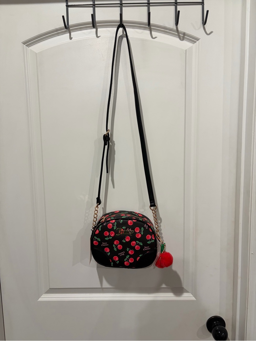 Juicy Couture Black Crossbody with Cherry Print and Red Pom
